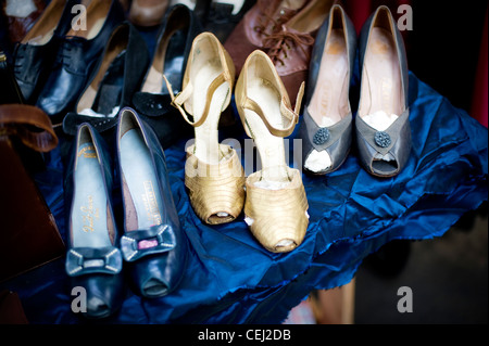 Vintage high heeled shoes, Ardingly antiques fair, West Sussex, England, UK Stock Photo