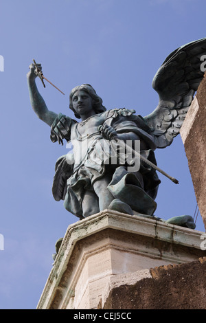 Sculpture of St. Michael the Archangel with a sword and libra striking ...