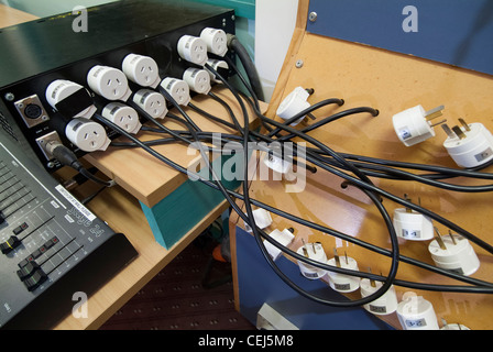 power sockets with lots of plugs Stock Photo