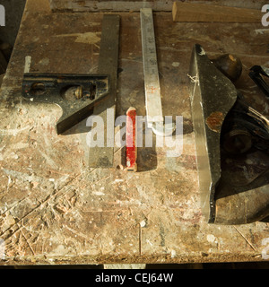 woodwork tools lined up on bench top Stock Photo