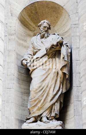 Religious statue outside the St. Sulpice in Paris Stock Photo