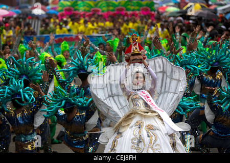 Fourth runner up to Sinulog Queen performs with her dance group,Sinulog Grande Parade 2012 Stock Photo