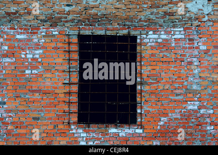 An old wall made from bricks with a window Stock Photo