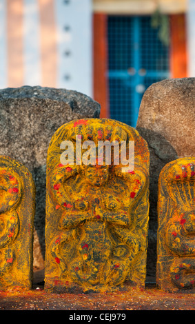 Hindu altar stones at a temple depicting Indian vishnu deity in the south indian countryside. Andhra Pradesh, India Stock Photo