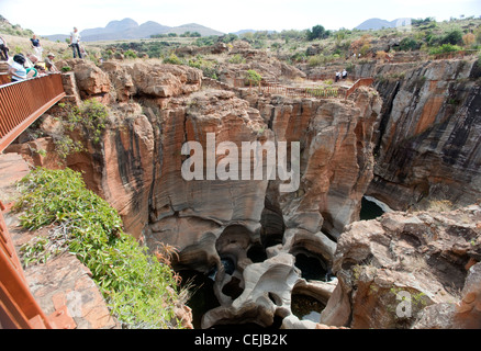 Tourist at observation point overlooking Bourkes Luck Potholes,Mpumalanga Stock Photo