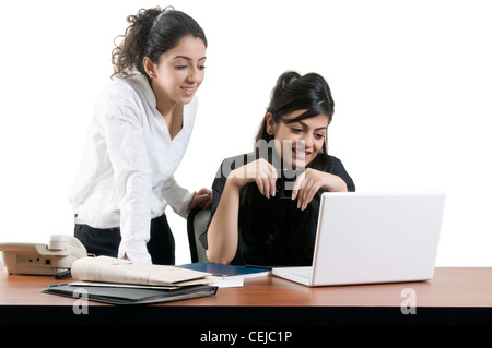two girls working Stock Photo