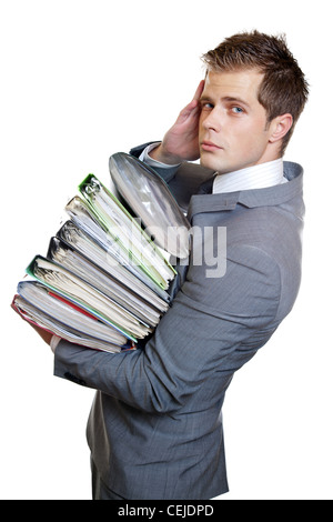 Business man with heavy workload Stock Photo