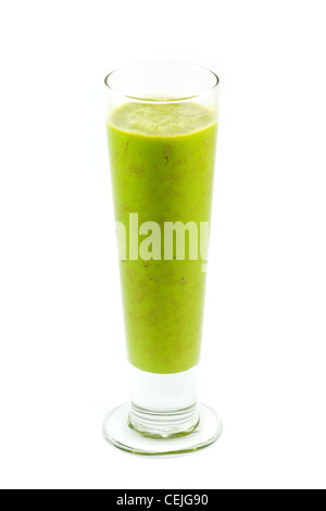 Fresh squeezed organic juice made from apples, avocados and spinach in a tall glass, isolated on a white background. Stock Photo