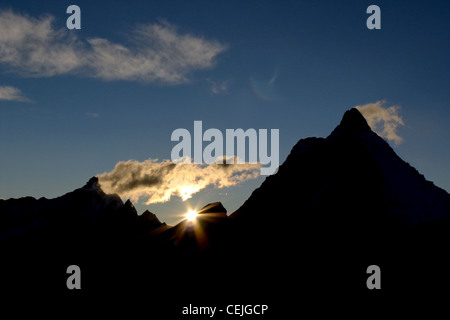 Sun setting behind the Matterhorn Stock Photo