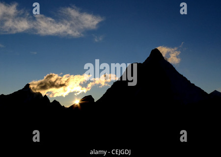 Sun setting behind the Matterhorn Stock Photo