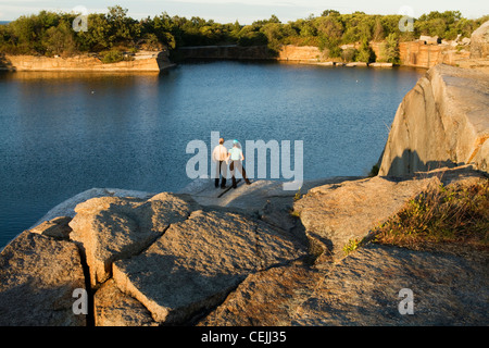 The granite quarry is a highlight of Halibut Point State Park in Rockport, Mass. Stock Photo