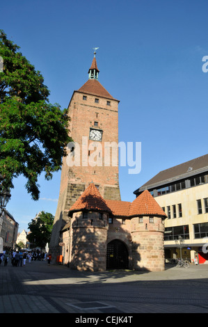 The Weisser Turm ( White Tower) was built in the 13th century. It was badly damaged in 1945 and rebuilt in 1977. It is now used as a metro station on Stock Photo