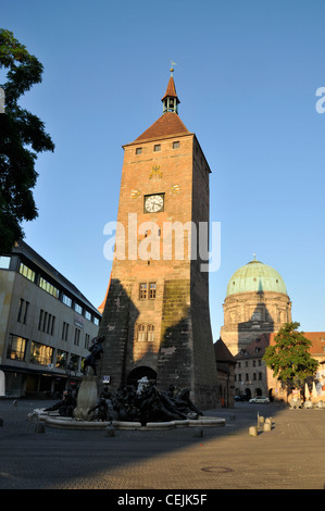 The Weisser Turm ( White Tower) was built in the 13th century. It was badly damaged in 1945 and rebuilt in 1977. It is now used as a metro station on Stock Photo