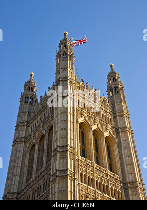 Union Jack flag flying Victoria Tower Houses of Parliament grade 1 listed UNESCO world heritage site London England Europe Stock Photo