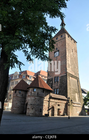 The Weisser Turm ( White Tower) was built in the 13th century. It was badly damaged in 1945 and rebuilt in 1977. It is now used as a metro station on Stock Photo