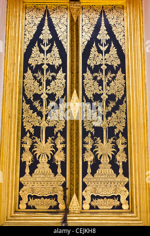 Traditional Thai style painting art on the temple door Stock Photo