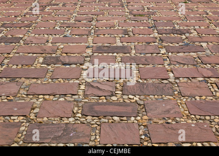 Stones of the pavement pattern of brick background Stock Photo