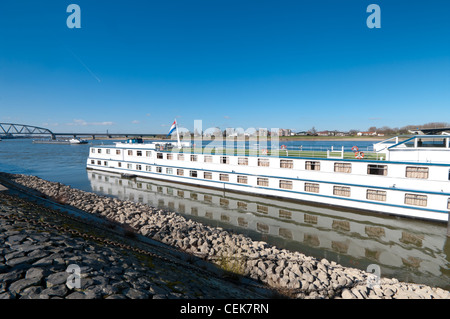 cruise ship on the Waal river in the Netherlands Stock Photo