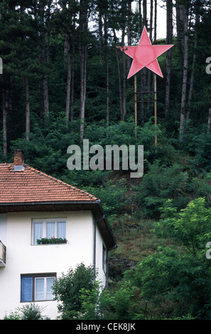Private house with a communistic red star fixed on a wooden construction, Bijelo Polje, Montenegro, Balkans Stock Photo