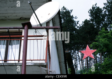 Private house with a communistic red star fixed on a wooden construction, Bijelo Polje, Montenegro, Balkans Stock Photo