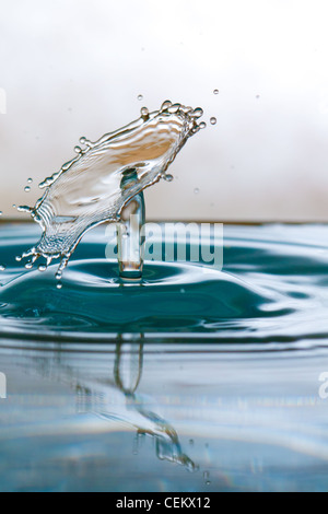 Water drop falling and colliding with another one Stock Photo