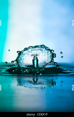 Water drop falling and colliding with another one Stock Photo