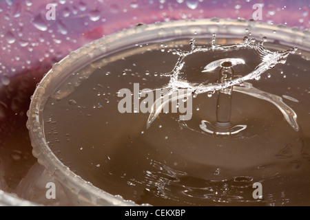 Water drop falling and colliding with another one Stock Photo