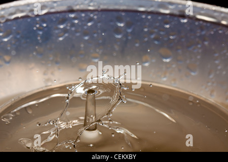 Water drop falling and colliding with another one Stock Photo