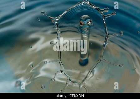 Water drop falling and colliding with another one Stock Photo