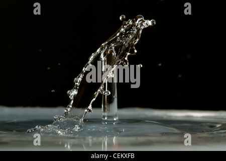 Water drop falling and colliding with another one Stock Photo