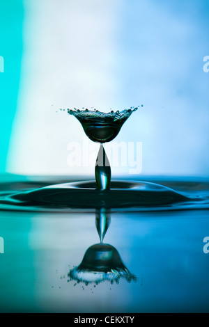 Water drop falling and colliding with another one Stock Photo