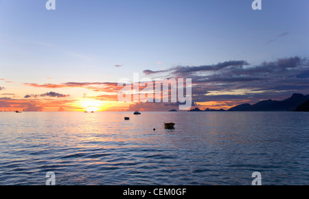 Anse à la Mouche, Mahé, Seychelles. View across the bay at sunset. Stock Photo