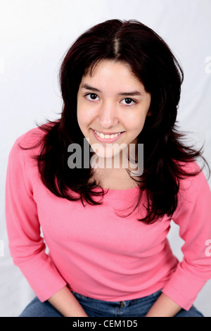 Young beautiful Mexican brunette latina woman with thick long hair