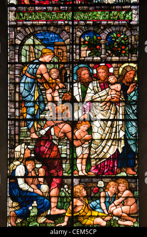 England, Salisbury, Salisbury Cathedral, Stained Glass Window, Jesus with Children Stock Photo