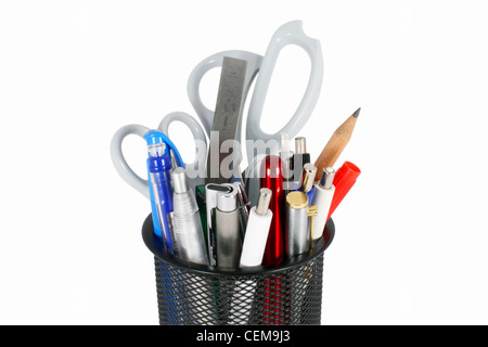 Black metal pencil cup filled with colorful used pencils, pens and scissors, isolated Stock Photo