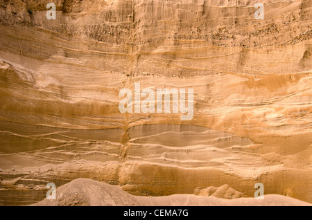 Geological layers of earth in deep sand pit. Stock Photo