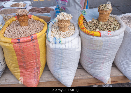 Open sacks of grains are on display for sale at the public market in Pujili, Ecuador. Stock Photo