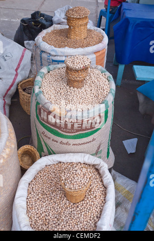 Open sacks of grains are on display for sale at the public market in Pujili, Ecuador. Stock Photo