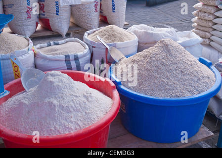 Open sacks of grains are on display for sale at the public market in Pujili, Ecuador. Stock Photo