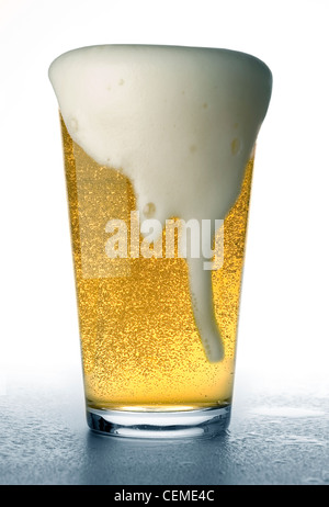 beer glass overflowing Stock Photo