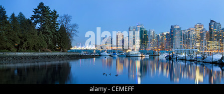 Vancouver BC Canada Skyline and Marina along False Creek from Stanley Park at Blue Hour Panorama Stock Photo