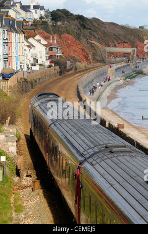 First Great Western HST train passes along the sea wall at Dawlish Stock Photo