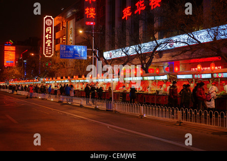 Food stalls at the Donghuamen Night Market, Beijing China Stock Photo