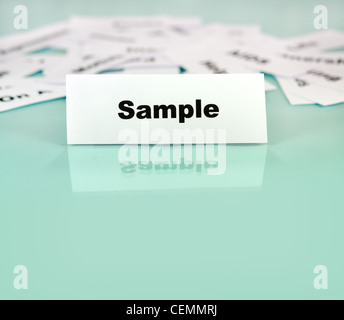 Piece of paper with sample word,sign or text on it Stock Photo