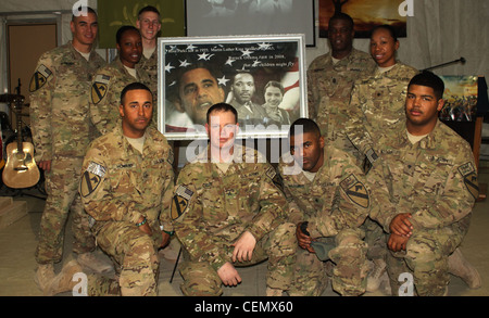 Soldiers from Headquarters Support Company, 615th Aviation Support Battalion 1st Air Cavalry Brigade, 1st Cavalry Division pose for a picture following a Black History Month observance that they had organized. Feb. 18, here. The theme for the event was â€œthe creation of freedomâ€ which focused on the contributions of black American inventors. The guest speaker for the event was Command Sgt. Maj. Gary Durant, the senior enlisted adviser for the 615th ASB. Stock Photo