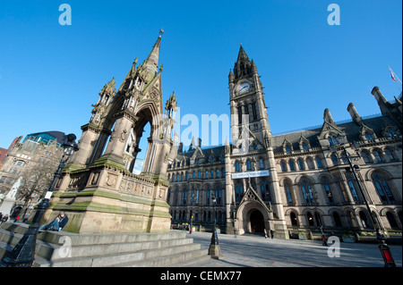 The Albert Memorial in Albert Square outside the town hall in Manchester City Centre on a clear day. Stock Photo