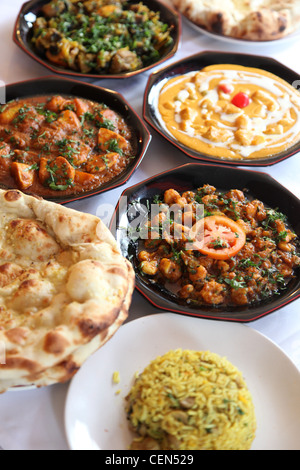 Dishes freshly prepared at an Indian restaurant in England Stock Photo