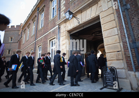 England, Berkshire, Eton, Students entering Eton College Stock Photo