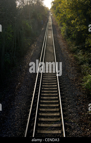 Railway line recedes into distance Stock Photo