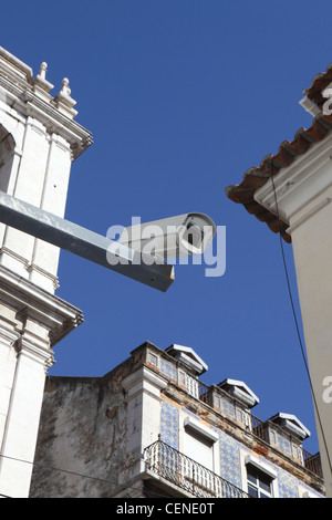looking-up at CCTV (closed circuit television) camera, in operation in historic central Lisbon, Portugal. Stock Photo